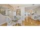 Elegant dining room with chandelier and hardwood floors at 1233 N Gulfstream Ave # 502, Sarasota, FL 34236