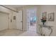 Elegant entryway with elevator access and view into living area at 1233 N Gulfstream Ave # 502, Sarasota, FL 34236