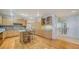 Modern kitchen with granite countertops and hardwood floors at 1233 N Gulfstream Ave # 502, Sarasota, FL 34236