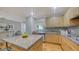 Modern kitchen with granite countertops and hardwood floors at 1233 N Gulfstream Ave # 502, Sarasota, FL 34236