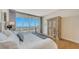 Spacious main bedroom with stunning water views and ample closet space at 1233 N Gulfstream Ave # 502, Sarasota, FL 34236