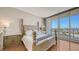 Main bedroom with water views and a comfortable bed at 1233 N Gulfstream Ave # 502, Sarasota, FL 34236