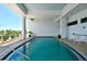 Resort-style swimming pool with surrounding lounge chairs at 1233 N Gulfstream Ave # 502, Sarasota, FL 34236