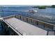 Spacious fishing deck with wooden railings, overlooking the calm water at 1255 E Peppertree Dr # 402, Sarasota, FL 34242