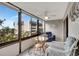 Sunroom with seating area and city views at 1255 E Peppertree Dr # 402, Sarasota, FL 34242