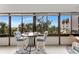 Sunroom with table and chairs, offering scenic views at 1255 E Peppertree Dr # 402, Sarasota, FL 34242