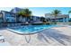 Inviting community pool with ample deck space and lounge chairs at 1255 E Peppertree Dr # 402, Sarasota, FL 34242