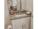 Bathroom with granite countertop and single sink vanity at 1273 Boulevard Of The Arts, Sarasota, FL 34236