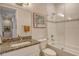 Clean bathroom with granite vanity and bathtub at 1273 Boulevard Of The Arts, Sarasota, FL 34236