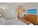 Spacious bedroom with a large TV and built-in dresser at 1273 Boulevard Of The Arts, Sarasota, FL 34236