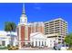 Historic church building with modern buildings in background at 1273 Boulevard Of The Arts, Sarasota, FL 34236