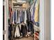 Large walk-in closet with ample hanging space and shelving at 1273 Boulevard Of The Arts, Sarasota, FL 34236