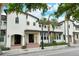 Three-unit townhome building, featuring modern design, and a welcoming front porch at 1273 Boulevard Of The Arts, Sarasota, FL 34236