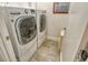 Convenient laundry room with washer and dryer at 1273 Boulevard Of The Arts, Sarasota, FL 34236