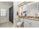 Bathroom with shower, toilet, and granite countertop at 1507 91St Nw Ct, Bradenton, FL 34209