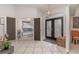 Bright entryway with double doors and view into bunk bedroom at 1507 91St Nw Ct, Bradenton, FL 34209