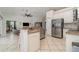 Stainless steel appliances and granite countertops in this kitchen at 1507 91St Nw Ct, Bradenton, FL 34209