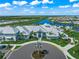 Community clubhouse with circular driveway and landscaping at 15147 Lyla Ter, Bradenton, FL 34211