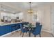 Bright dining area with kitchen island and pendant lighting at 15147 Lyla Ter, Bradenton, FL 34211