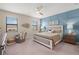 Spacious main bedroom with a large bed and tranquil decor at 15147 Lyla Ter, Bradenton, FL 34211