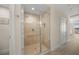 Walk-in shower with glass enclosure at 166 Golden Gate Pt # 21, Sarasota, FL 34236