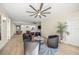 Open living room with modern furniture and hardwood floors at 166 Golden Gate Pt # 21, Sarasota, FL 34236