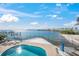 Community pool with waterfront access at 166 Golden Gate Pt # 21, Sarasota, FL 34236