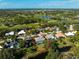 Aerial view of the home and surrounding neighborhood at 2008 Tocobaga Ln, Nokomis, FL 34275