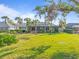 Home with a large backyard and screened patio at 2115 Calusa Lakes Blvd, Nokomis, FL 34275