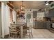 Bright dining area with farmhouse style table and chairs at 2206 25Th W Ave, Bradenton, FL 34205