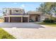 Two-story house with three-car garage and brick driveway at 2232 Elcid Ct, Palm Harbor, FL 34683