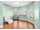 Peaceful office with light walls and hardwood floors at 2232 Elcid Ct, Palm Harbor, FL 34683