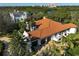 Luxury home with tile roof and expansive grounds at 230 Osprey Point Dr, Osprey, FL 34229