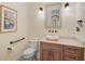 Well-appointed bathroom with updated vanity, modern fixtures, and a comfort height toilet at 230 Osprey Point Dr, Osprey, FL 34229