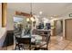 Cozy dining area with a glass-top table and four chairs at 230 Salisbury St, Port Charlotte, FL 33954