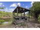 Waterfront gazebo with seating for relaxation at 230 Salisbury St, Port Charlotte, FL 33954