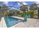 Relaxing screened pool with patio and seating at 230 Salisbury St, Port Charlotte, FL 33954