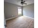 Simple bedroom with tile floors and large window at 2309 30Th W Ave, Bradenton, FL 34205