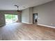 Bright living room featuring tile floors and sliding glass doors leading to patio at 2309 30Th W Ave, Bradenton, FL 34205