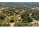 Aerial view showing a single-Gathering home with a large yard at 2415 Nowatney Ave, North Port, FL 34286