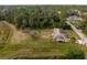 Aerial view showing house, lot, and road at 2415 Nowatney Ave, North Port, FL 34286