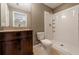 Clean bathroom with granite vanity and shower/tub combo at 2415 Nowatney Ave, North Port, FL 34286