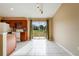 Kitchen dining area with view to backyard and sliding glass doors at 2415 Nowatney Ave, North Port, FL 34286