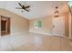 Spacious living room featuring tile floors and a neutral color palette at 2415 Nowatney Ave, North Port, FL 34286