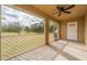 Bright screened porch overlooks a spacious backyard at 2415 Nowatney Ave, North Port, FL 34286