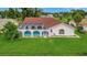 Property view showcasing the house and pool area at 26071 Paysandu Dr, Punta Gorda, FL 33983