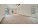 Bright living room with sliding doors leading to pool at 26071 Paysandu Dr, Punta Gorda, FL 33983