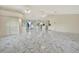 Spacious living room with marble flooring and high ceilings at 26071 Paysandu Dr, Punta Gorda, FL 33983