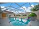 Inviting pool with screened enclosure and patio at 26071 Paysandu Dr, Punta Gorda, FL 33983