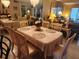 Bright dining room with table and six chairs at 2657 Woodgate Ln # E4, Sarasota, FL 34231